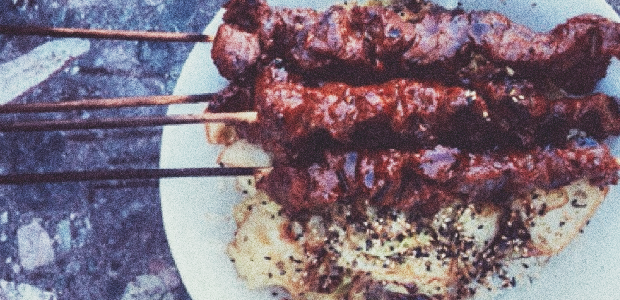 Kalbi marinated venison on a stick with coconut oil fried cabbage and furikaki rice